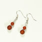 Top view of Small Matte Red Agate Earrings.