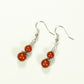 Top view of Small Natural Red Jasper Earrings.