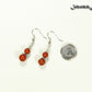 Small Natural Red Jasper Earrings beside a dime.