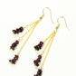 Top view of Long Gold Plated Chain and Garnet Crystal Chip Earrings.