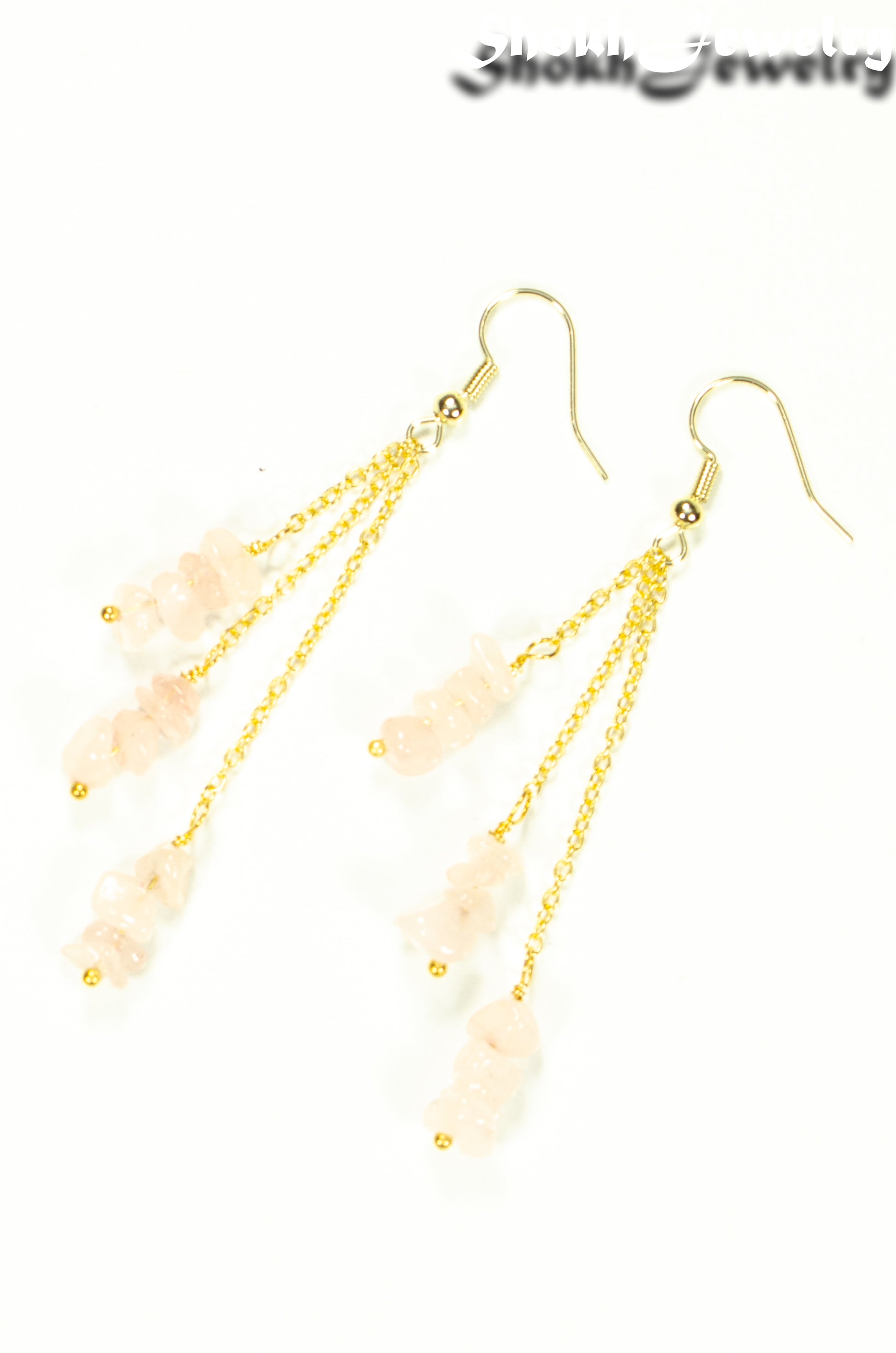 Top view of Long Gold Plated Chain and Rose Quartz Crystal Chip Earrings.