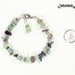 Natural Rainbow Fluorite Crystal Chip Bracelet beside a dime.