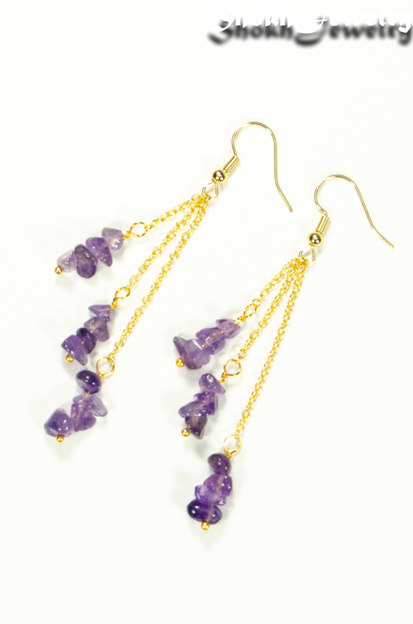 Top view of Long Gold Plated Chain and Amethyst Crystal Chip Earrings.