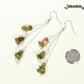Long Silver Plated Chain and Unakite Crystal Chip Earrings beside a dime.