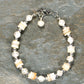 Top view of Freshwater Pearl and Seashell Bracelet with Clasp.