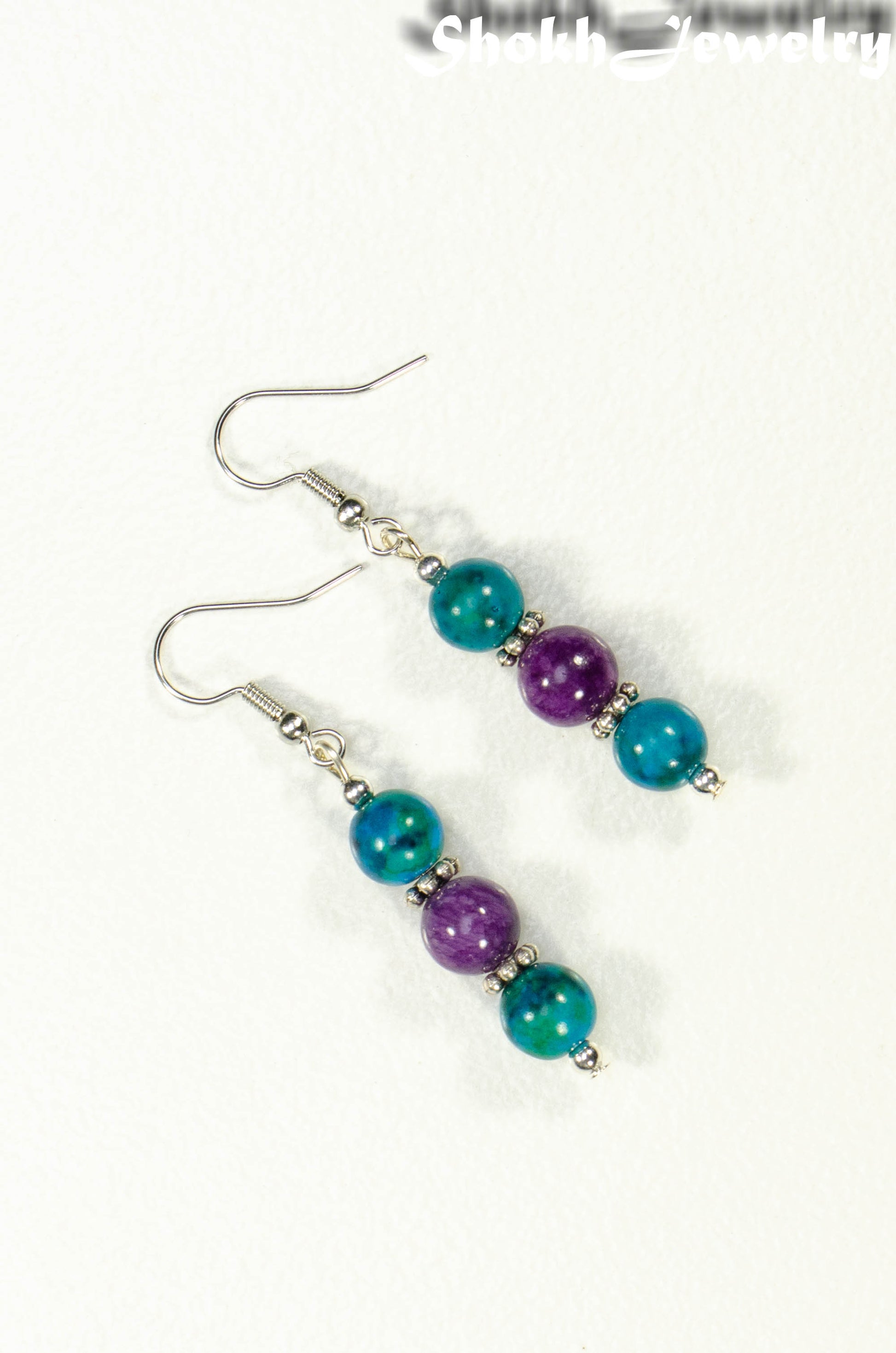 Top view of Purple Quartzite and Blue Jade Beaded Bar Earrings.