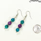 Purple Quartzite and Blue Jade Beaded Bar Earrings beside a dime.