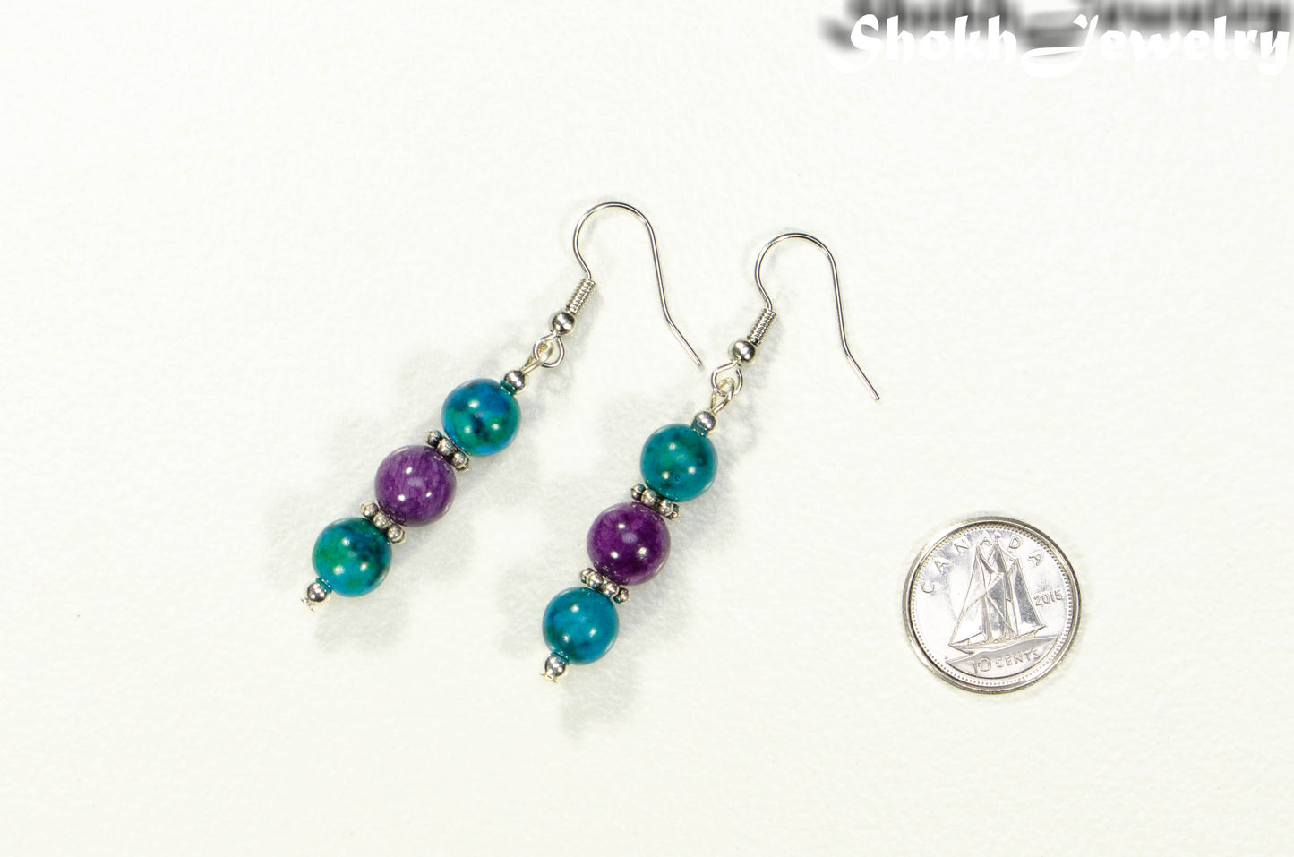 Purple Quartzite and Blue Jade Beaded Bar Earrings beside a dime.