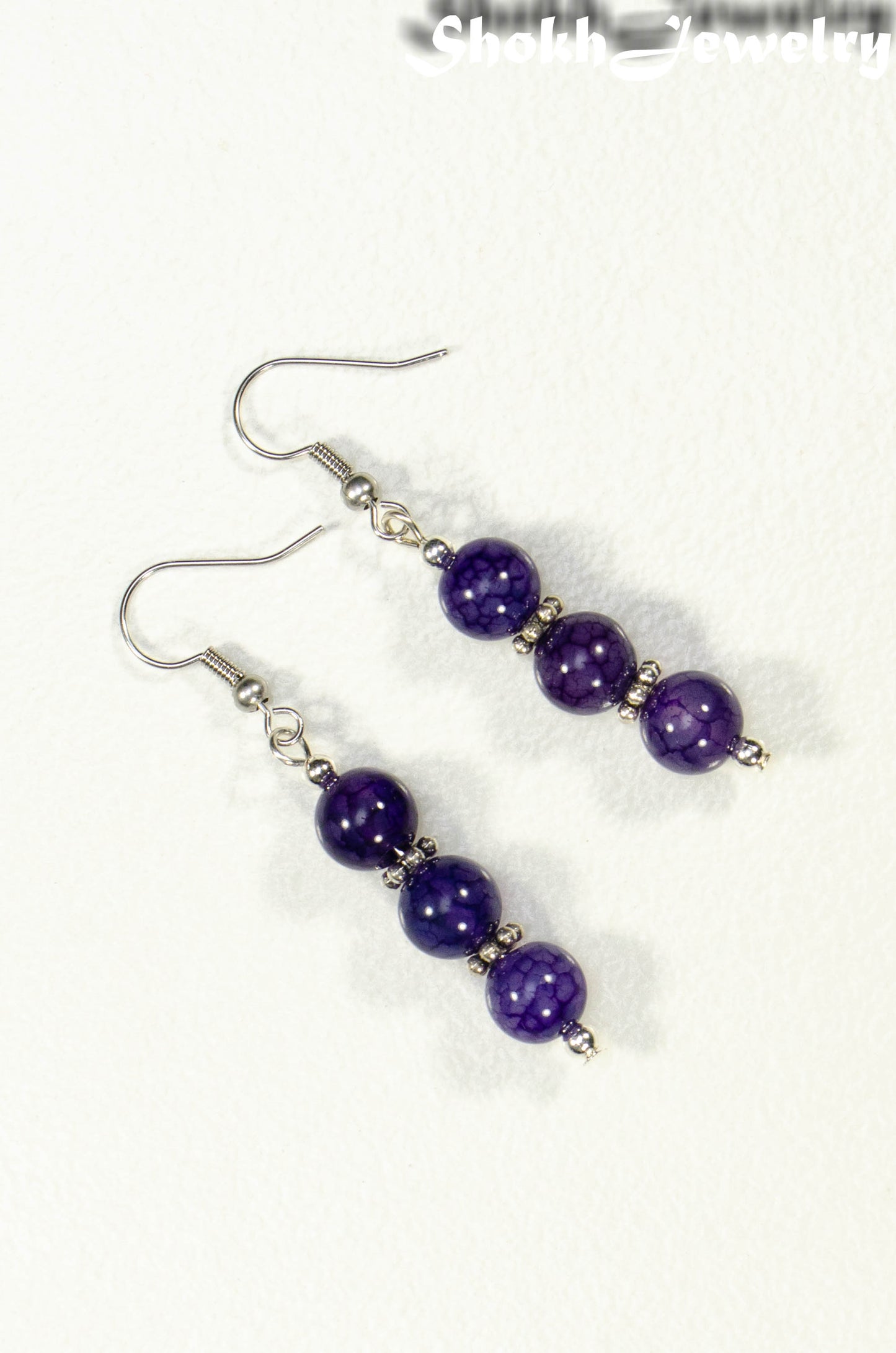 Top view of Natural Purple Agate Beaded Bar Earrings.