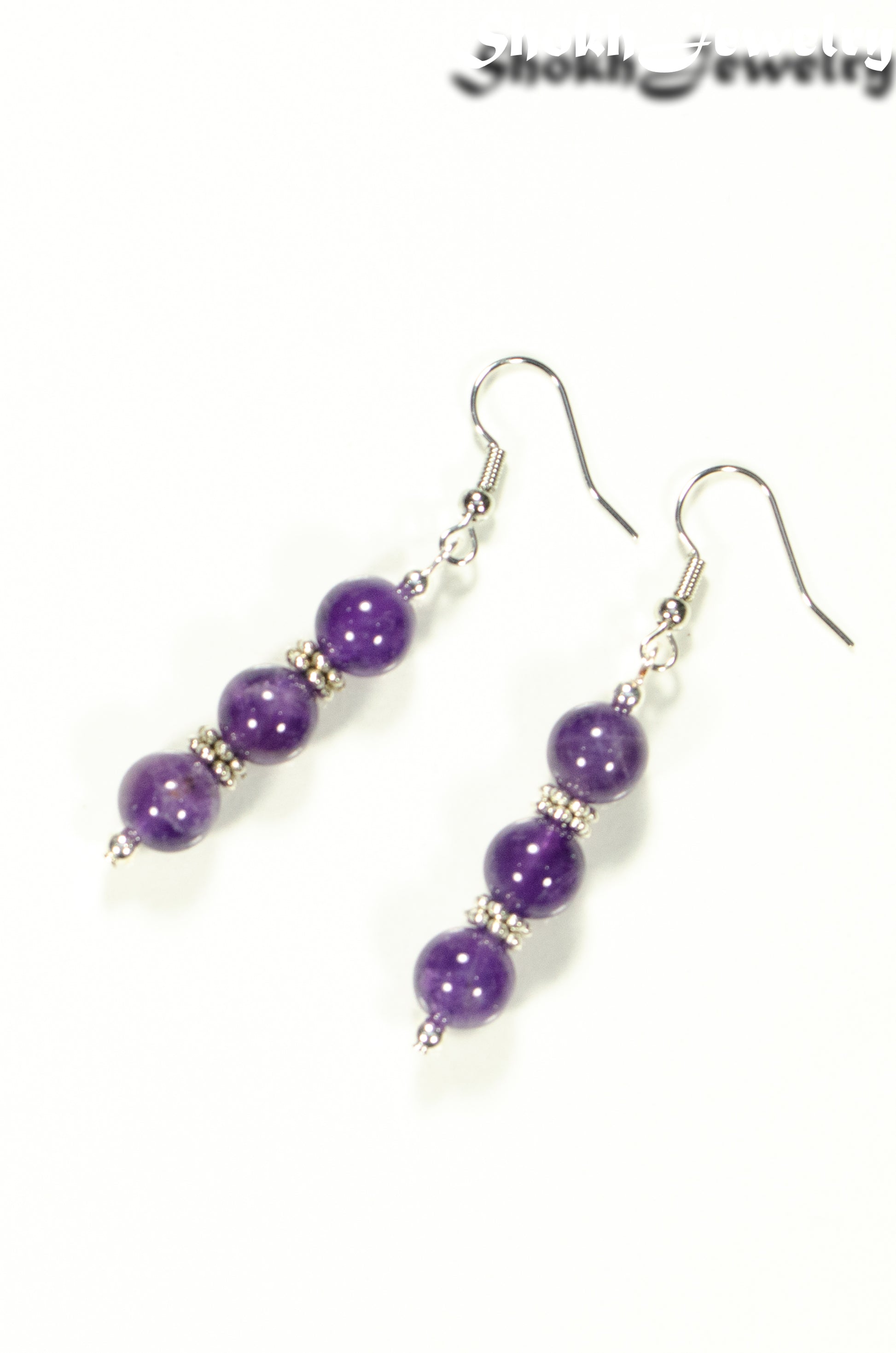 Top view of Natural Amethyst Beaded Bar Earrings.