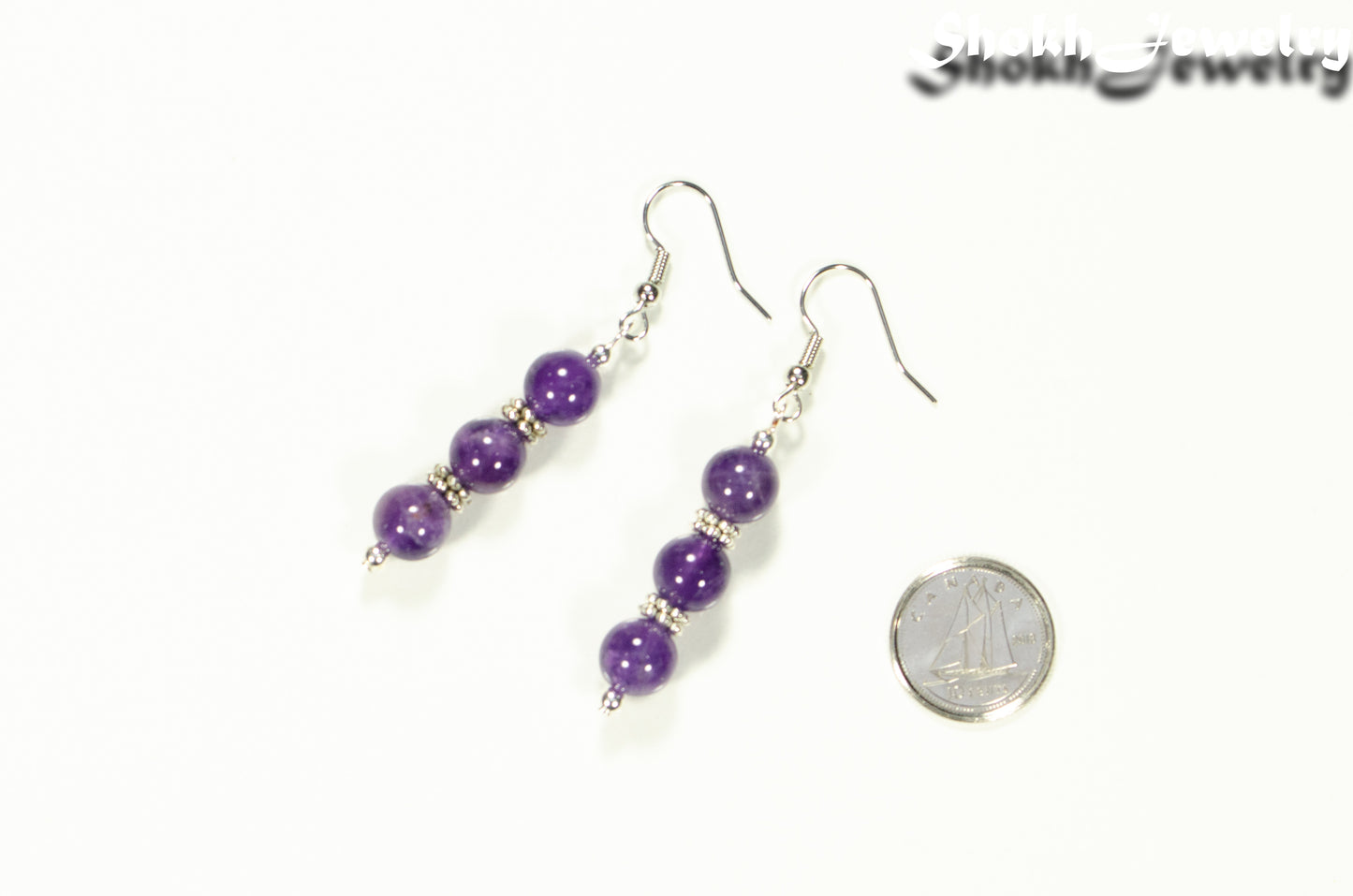 Natural Amethyst Beaded Bar Earrings beside a dime.