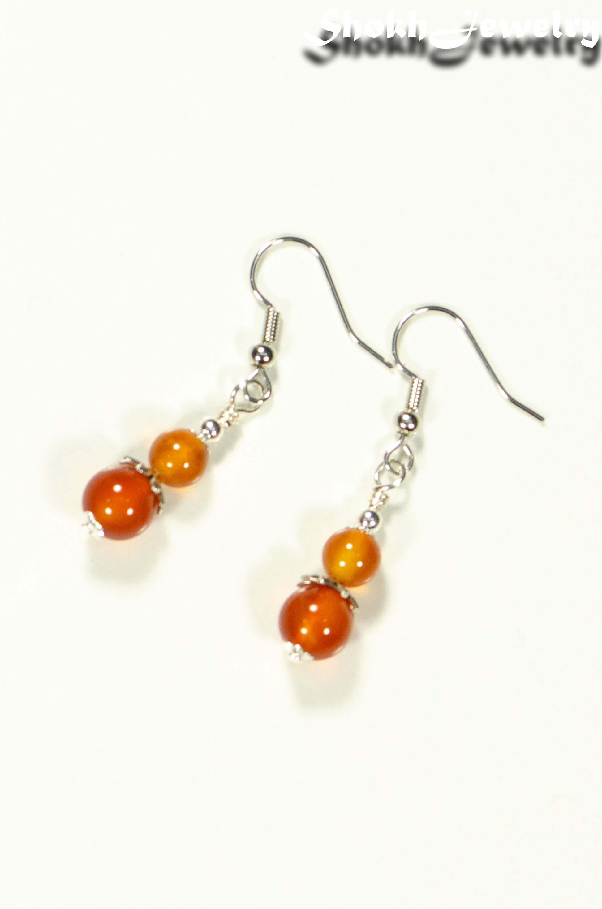 Top view of Small Natural Carnelian Earrings.