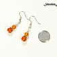 Small Natural Carnelian Earrings beside a dime.