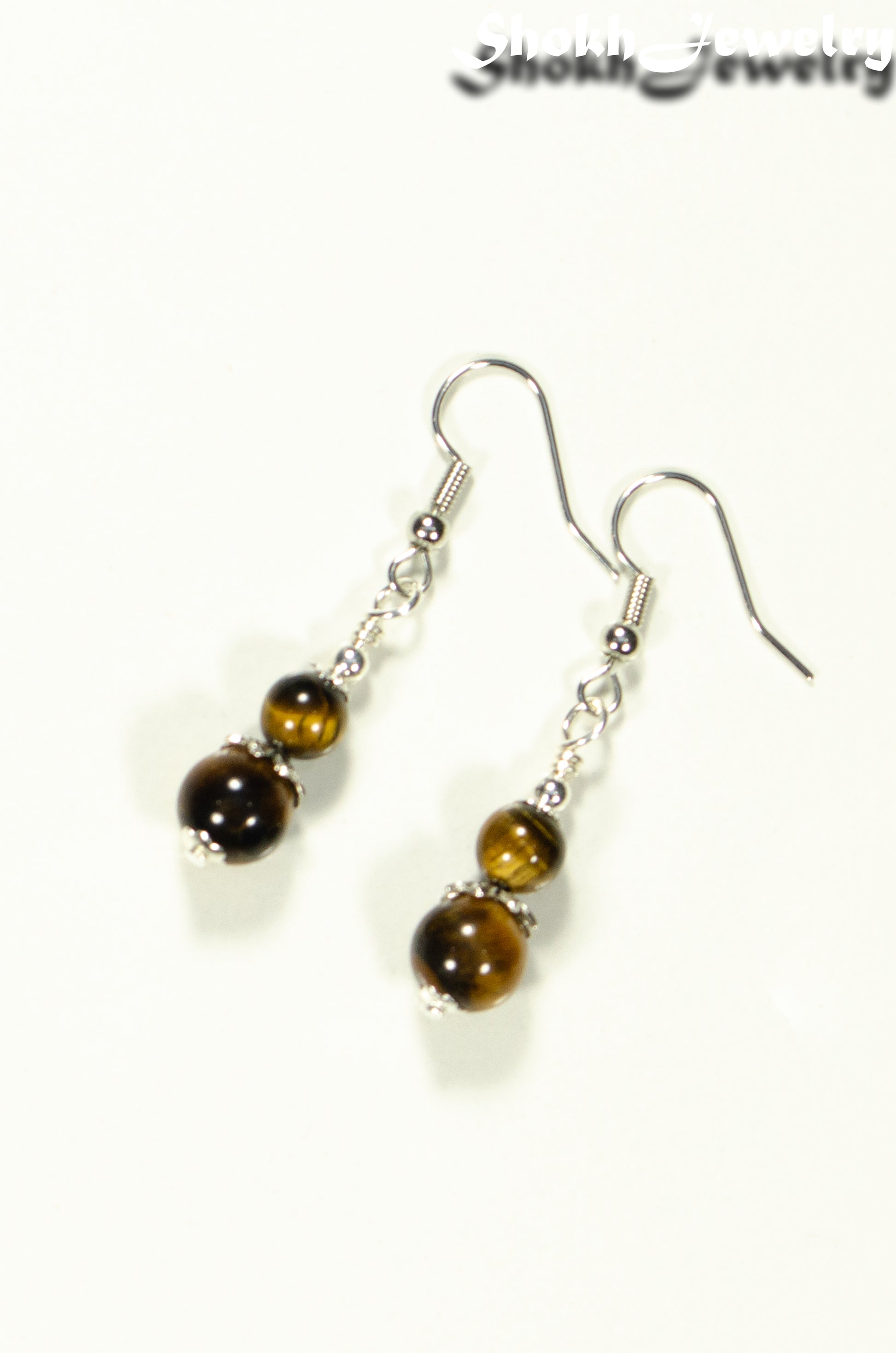Top view of Small Tiger's Eye Earrings.