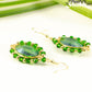 Oval Green Glass Crystal Wire Wrapped Earrings with gold tone ear wires.