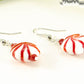 Close up of Christmas Peppermint Glass Bead Earrings.