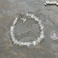 Natural White Opal Crystal Chip Bracelet  beside a dime.