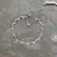 Handmade Clear Quartz Link Chain Anklet for Women beside a dime.