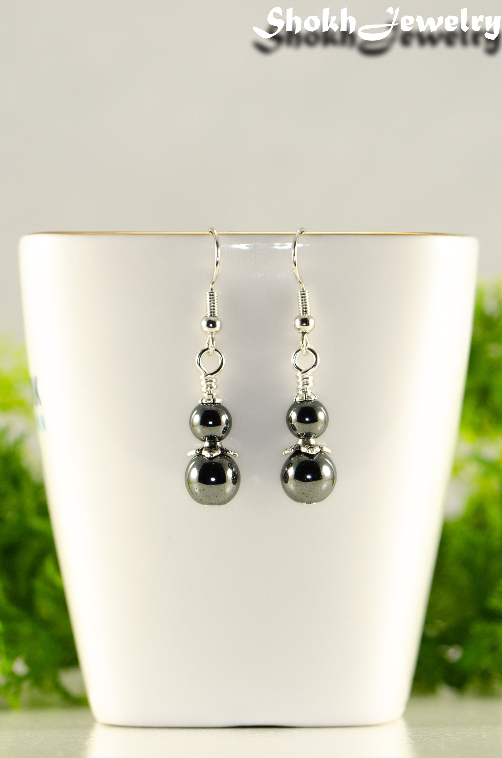 Close up of Small Natural Hematite Earrings.