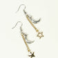 Top view of Crescent Moon and Mismatched Gold Star Earrings.