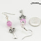 Light Purple Quartzite and Key Charm Dangle Earrings beside a dime.