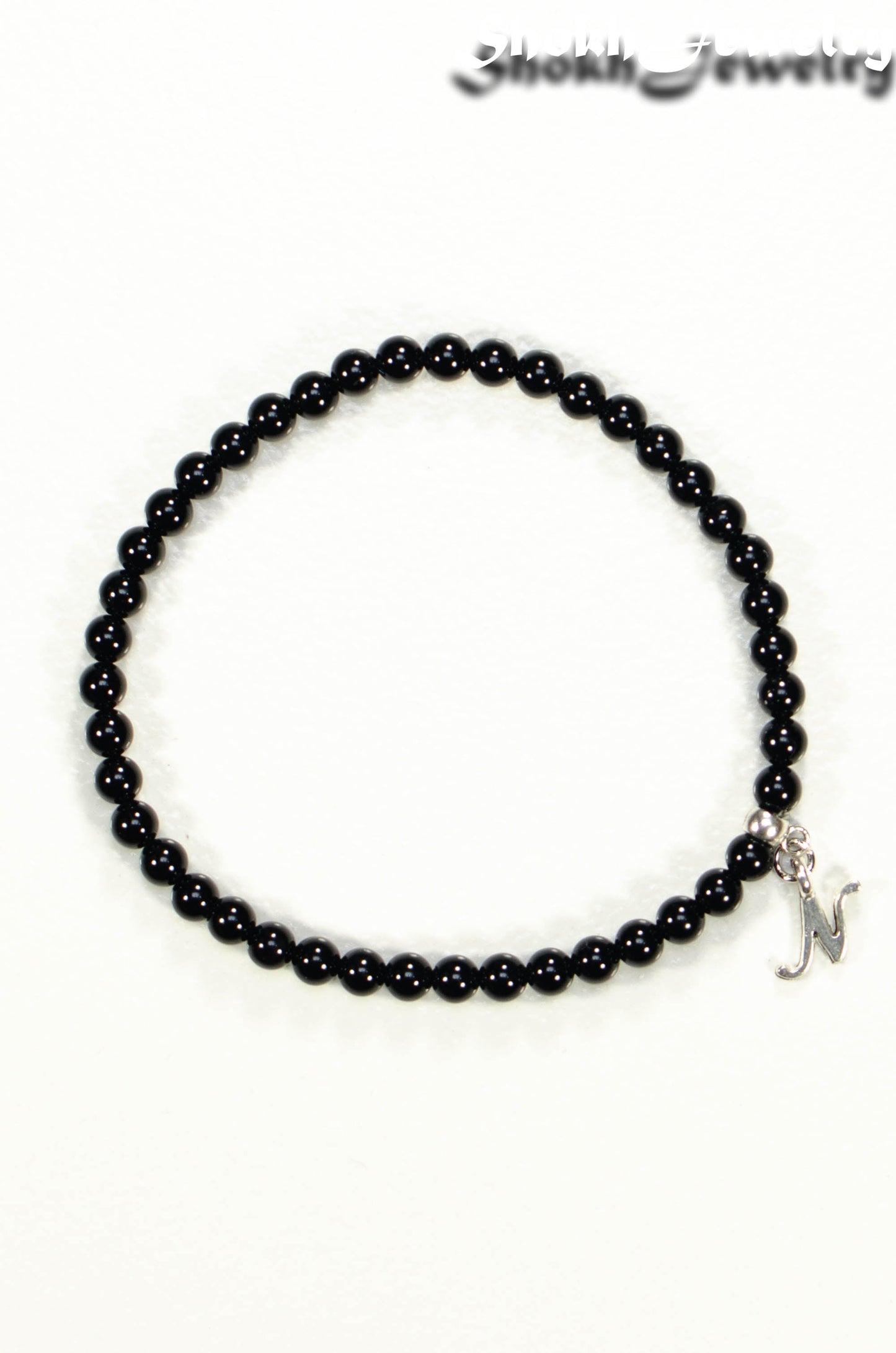 Top view of Black Onyx Bracelet with Initial
