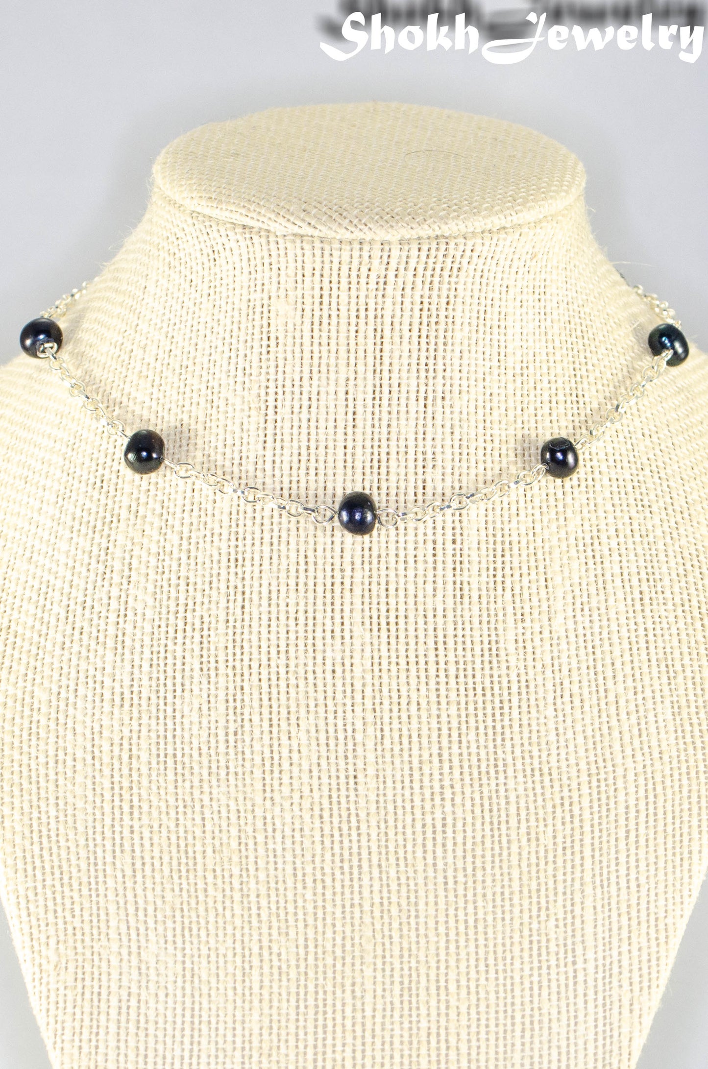 Close up of Black Freshwater Pearl and Dainty Chain Choker Necklace.