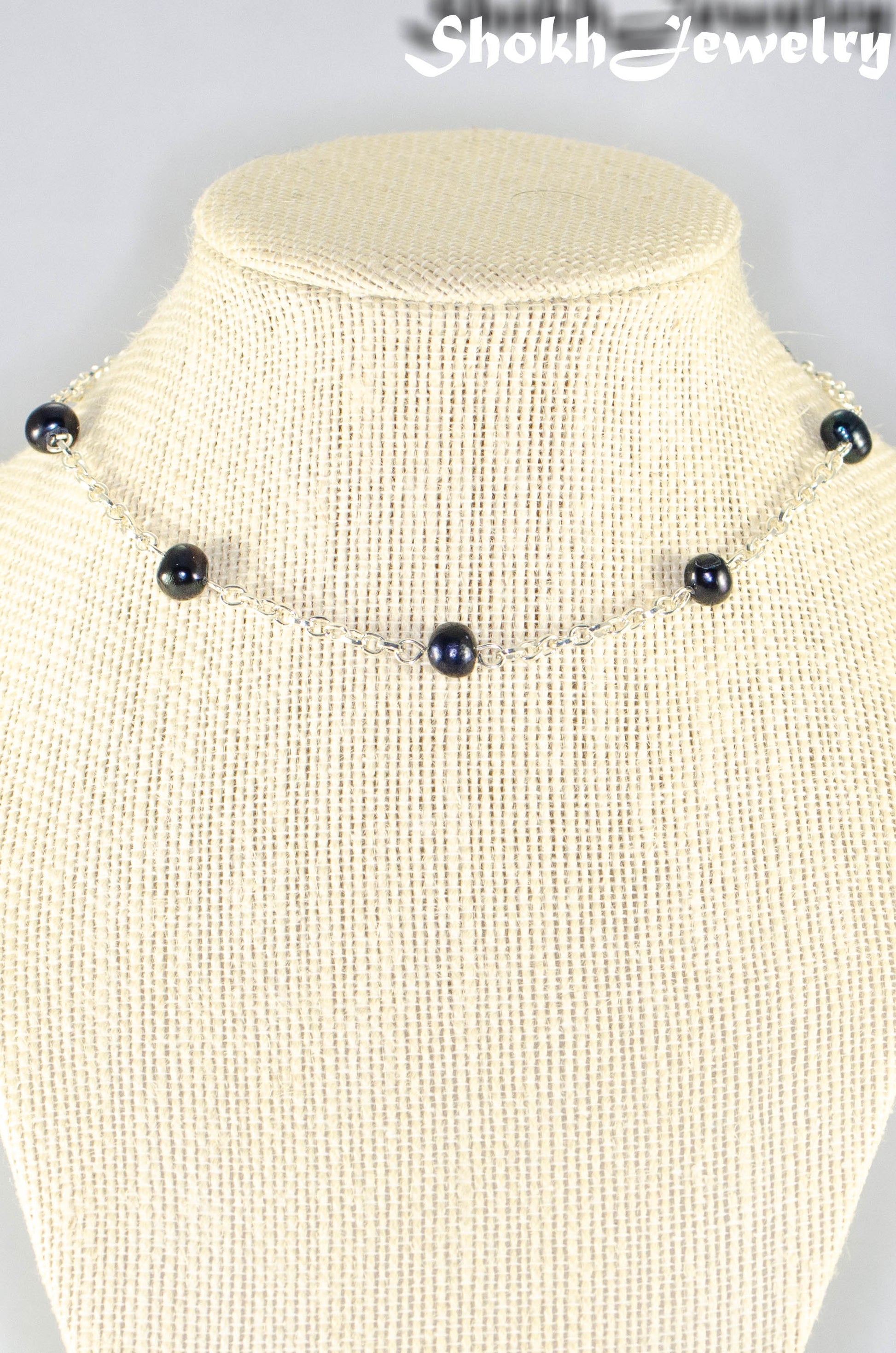 Close up of Black Freshwater Pearl and Dainty Chain Choker Necklace.