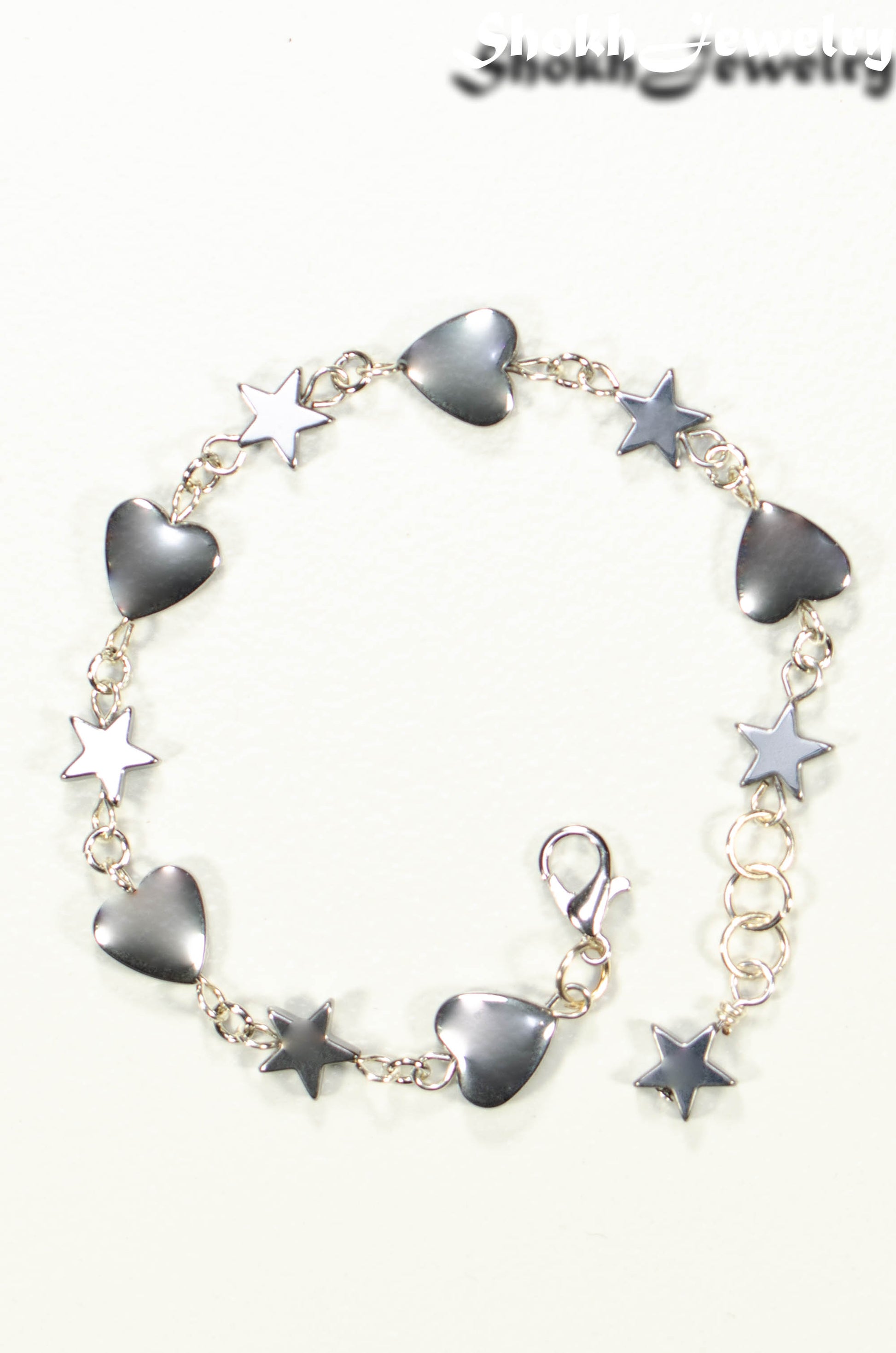 Top view of Handmade Hematite Heart and Star Link Bracelet.