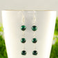 Close up of Long Genuine Malachite Dangle Earrings.