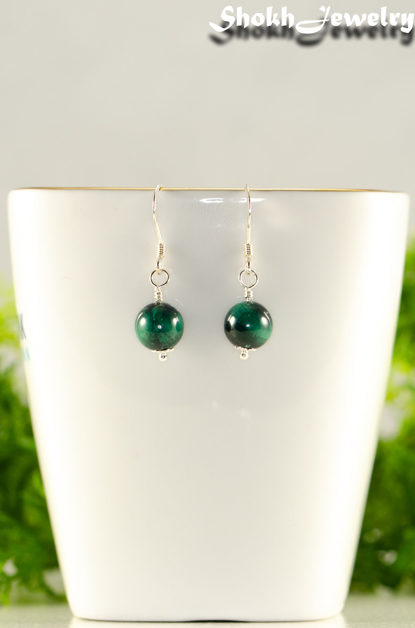 Close up of Small Genuine Malachite Drop Earrings.