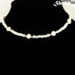 Freshwater Pearl and White Seed Bead Choker Necklace with Silver Plated Spacers displayed on a bust.