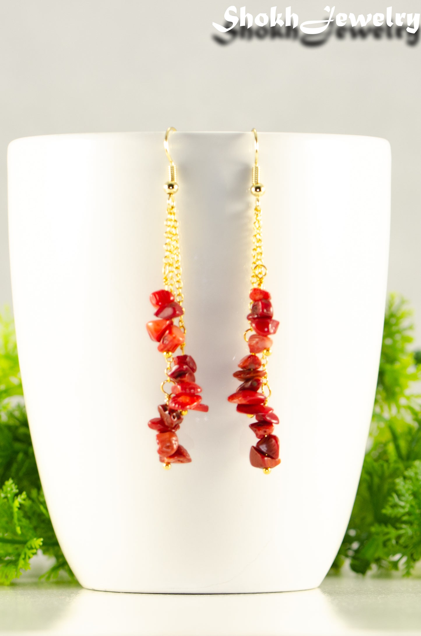 Close up of Long Gold Plated Chain and Red Dyed Bamboo Coral Chip Earrings.