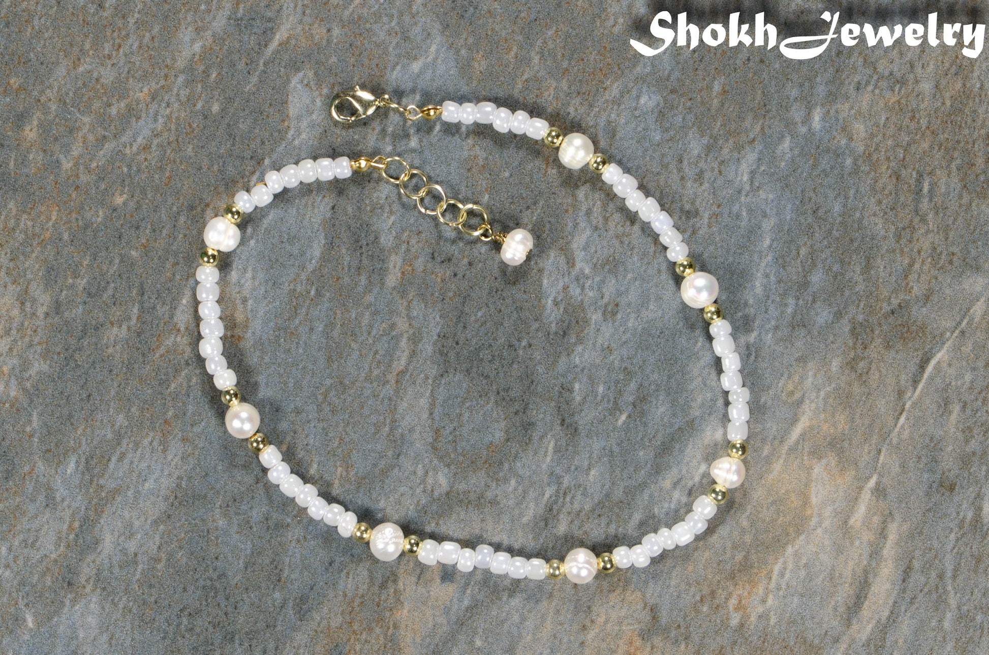 Top view of Freshwater Pearl and White Seed Bead Choker Necklace with Gold Plated Spacers.