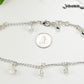 Sparkly Glass Crystal Dangle and Chain Anklet beside a dime.