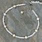 Top view of Freshwater Pearl and White Seed Bead Choker Necklace with Silver Plated Spacers.