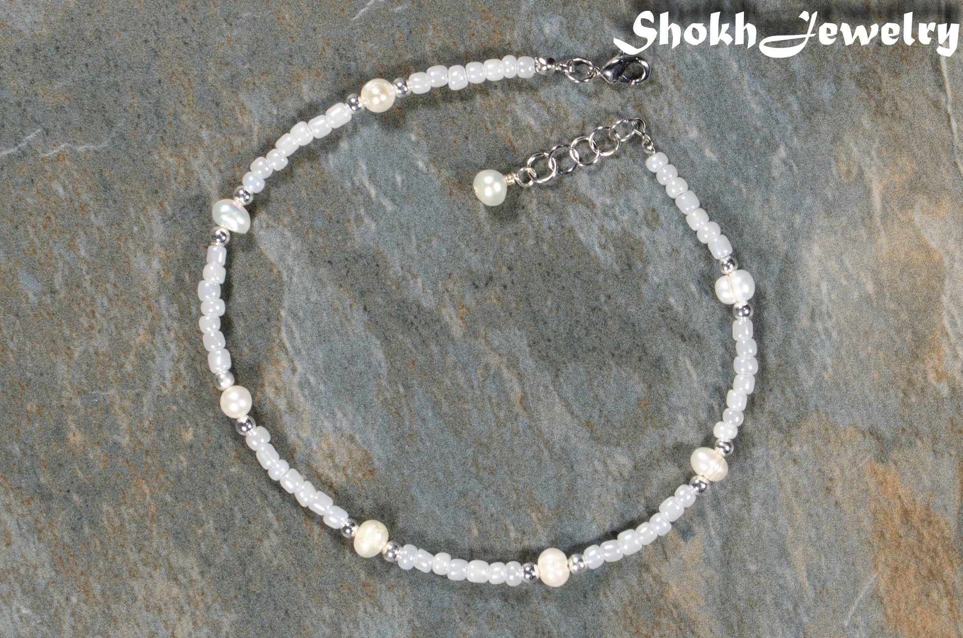 Top view of Freshwater Pearl and White Seed Bead Choker Necklace with Silver Plated Spacers.