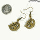 Antique Bronze Masquerade Mask Charm Earrings beside a dime.