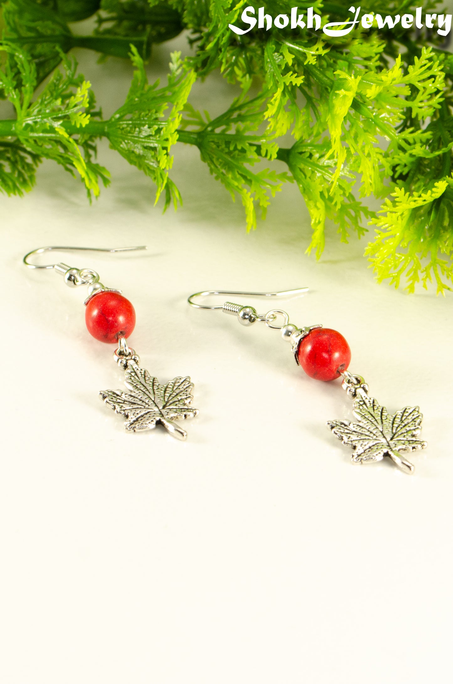 Red Howlite and Tibetan Silver Maple Leaf Dangle Earrings.