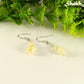 Small Natural Citrine Crystal Earrings with silver tone ear wires.