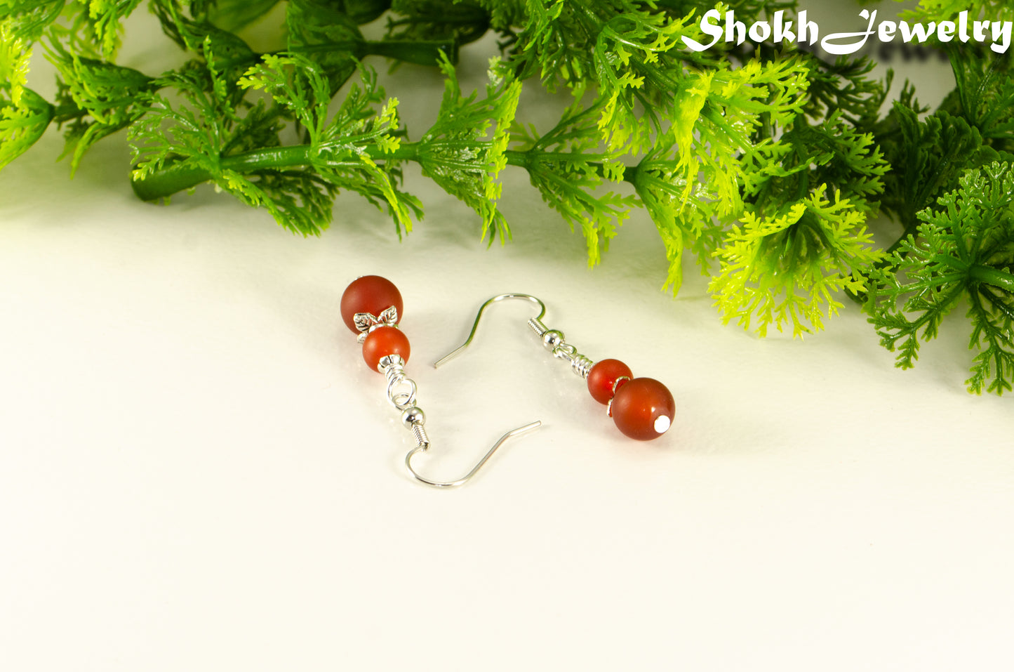 Details of Small Matte Red Agate Earrings.