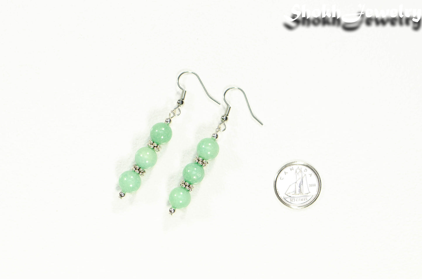 Natural Mint Green Quartz Beaded Bar Earrings beside a dime.