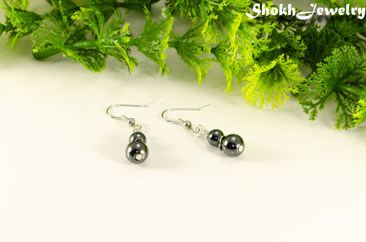 Small Natural Hematite Earrings with silver tone ear wires.