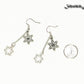 Long Chain and Snowflakes Charm Earrings beside a dime.