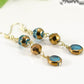 Gold and Patina Blue Glass Bead Dangle Earrings