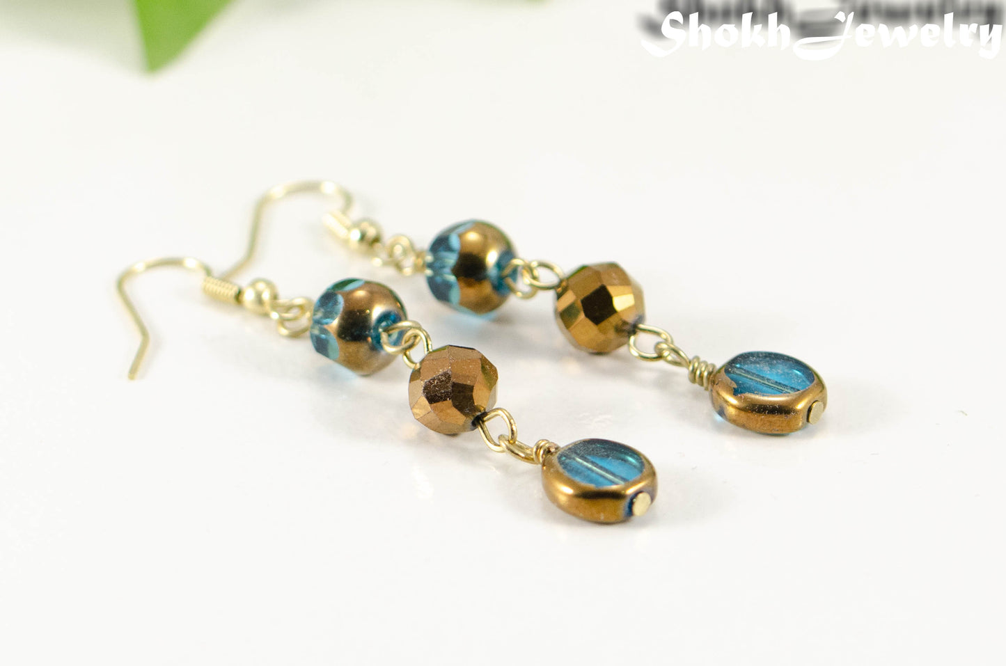 Gold and Patina Blue Glass Bead Dangle Earrings