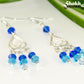 Close up of Ombre Blue Glass Crystal Chandelier Earrings.