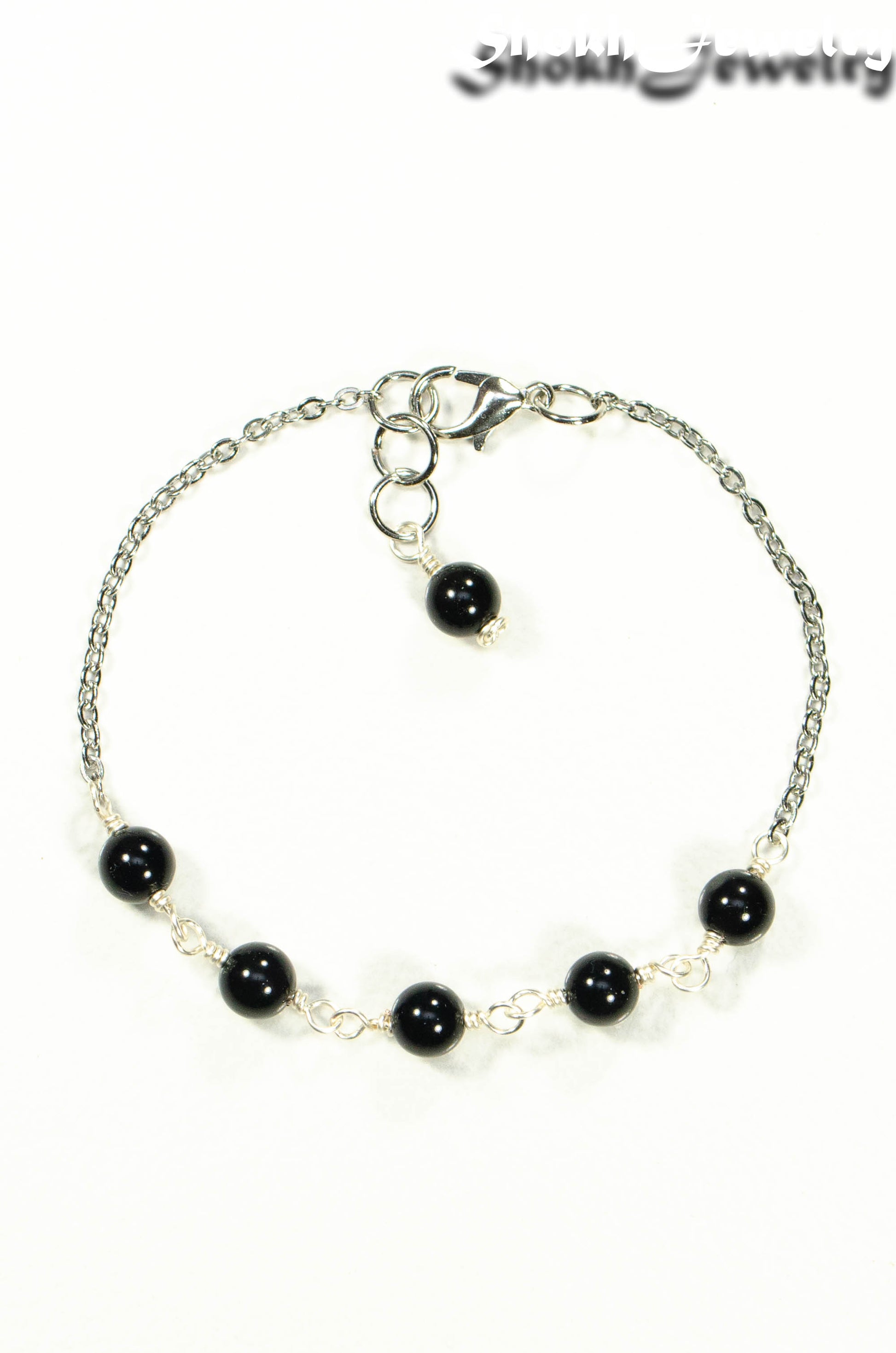 Top view of Black Obsidian and Stainless Steel Chain bracelet.