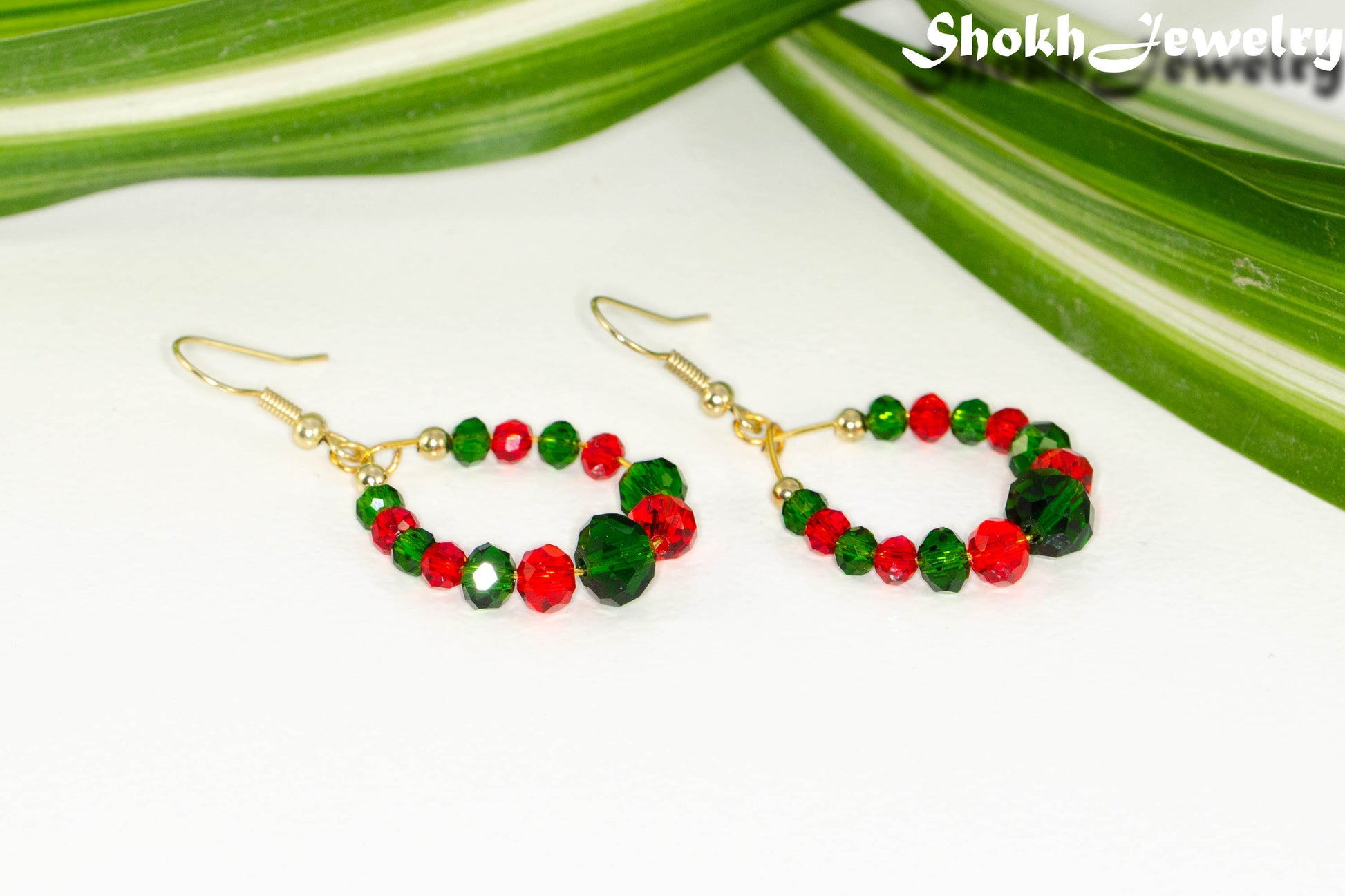 Green and Red Glass Crystal Hoop Earrings with gold tone ear wires.