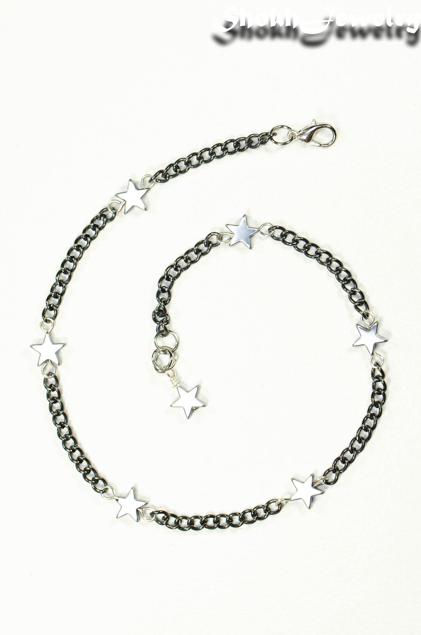 Top view of Natural Hematite Star and Black Chain Anklet.